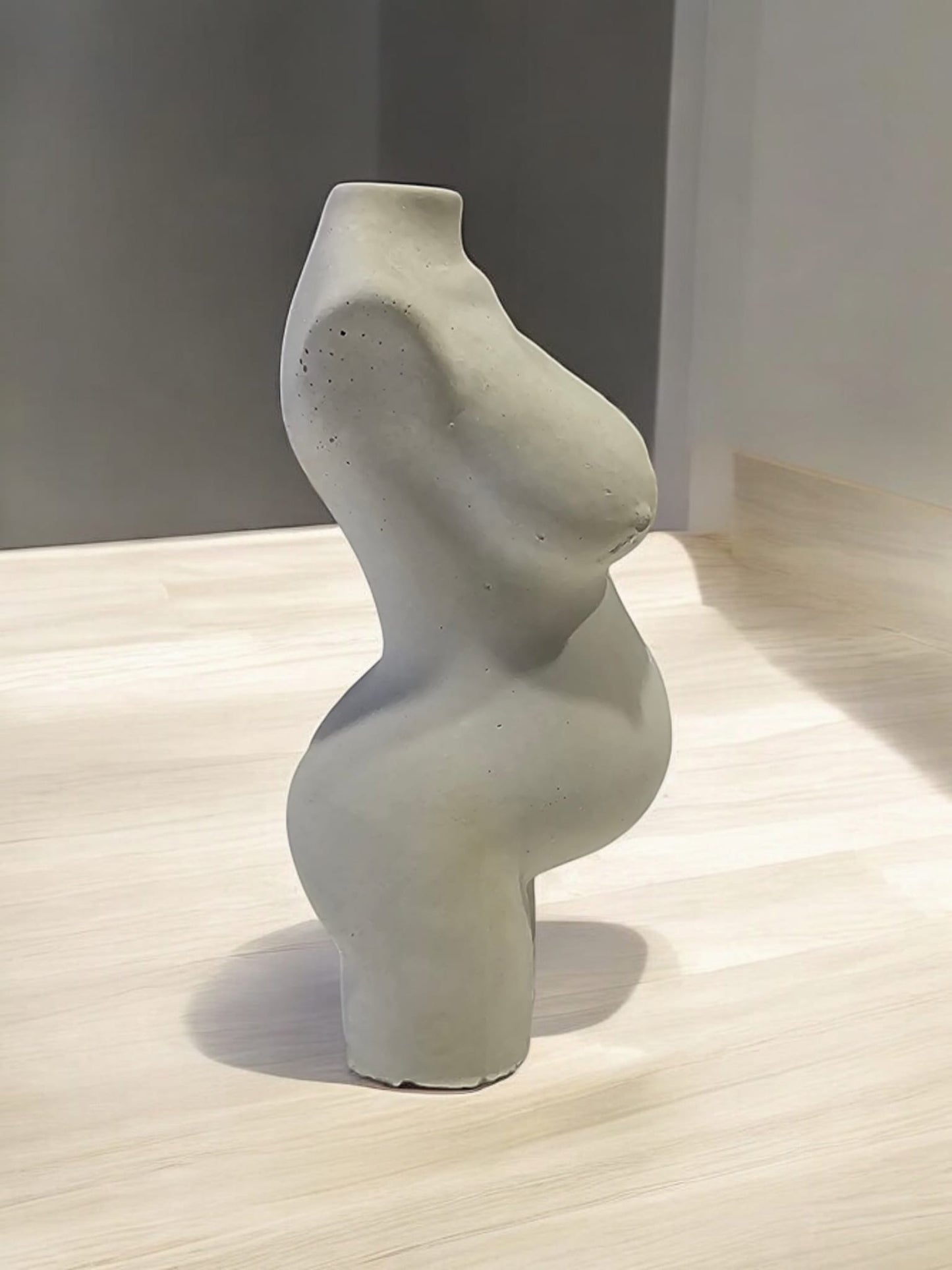 Graceful Maternity Concrete Sculpture